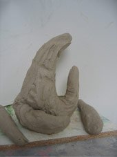 The sculpture begins