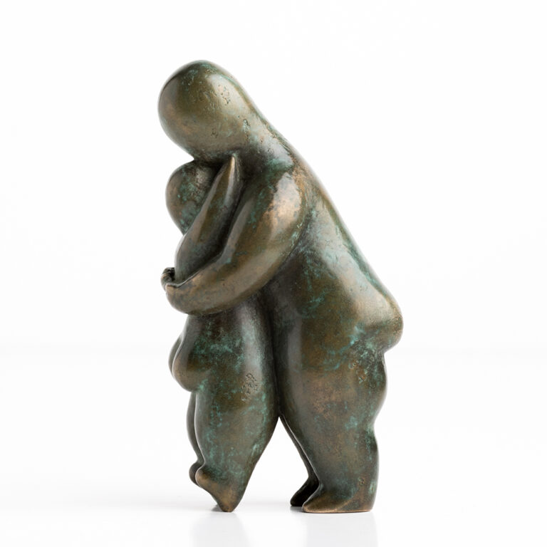 Mini female figure hugging child on tip toes
