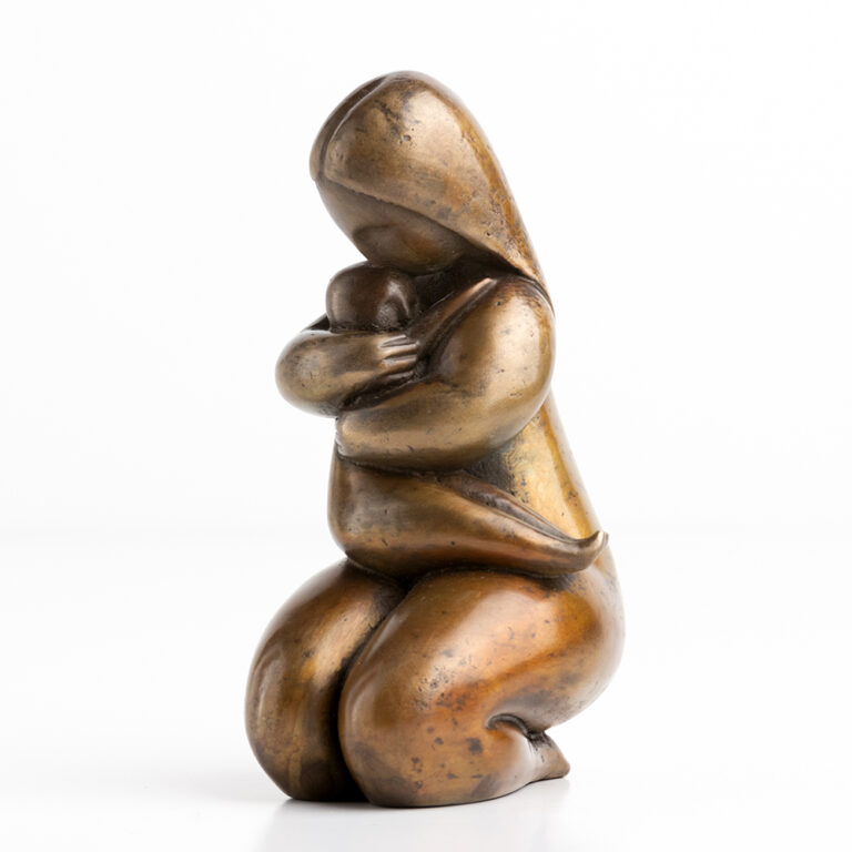 Female figure kneeling with child